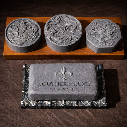 Oriental Obsidian Guest Soap Set includes three LuxeRefined™ dragon bars with amber, tobacco, and oud notes plus tussah silk and camellia oil for a bold, refined cleanse.